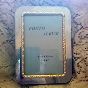 A promotional AAA Travel Agency photo album